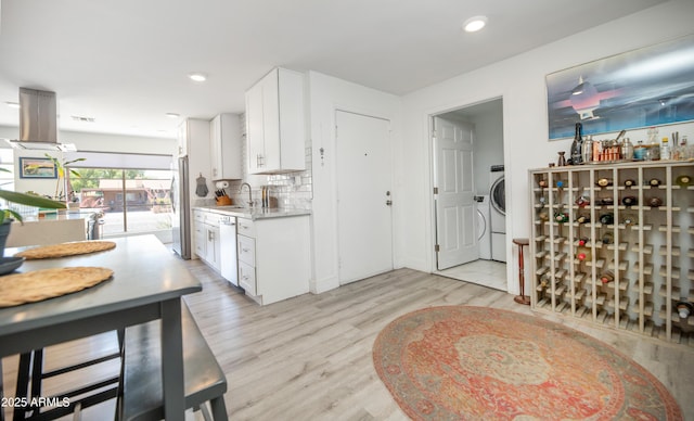 2320 E Mulberry Dr, Phoenix, AZ 85016 - kitchen featuring freestanding refrigerator, light wood-style floors, white dishwasher, island range hood, and white cabinetry
