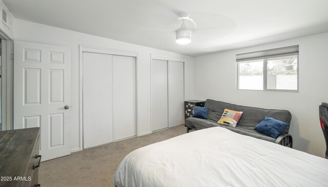 2320 E Mulberry Dr, Phoenix, AZ 85016 - carpeted bedroom featuring multiple closets and ceiling fan