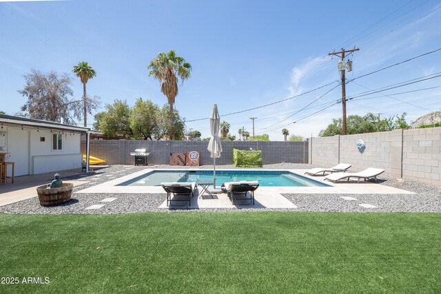 2320 E Mulberry Dr, Phoenix, AZ 85016 - view of swimming pool with a lawn, a fenced backyard, a fenced in pool, and a patio