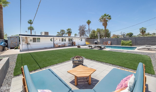 2320 E Mulberry Dr, Phoenix, AZ 85016 - exterior space with a patio area, a fenced in pool, a fenced backyard, an outdoor fire pit, and a yard
