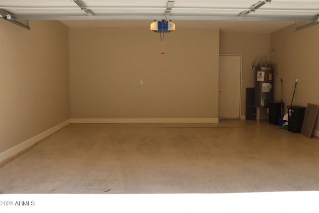 garage featuring electric water heater and a garage door opener