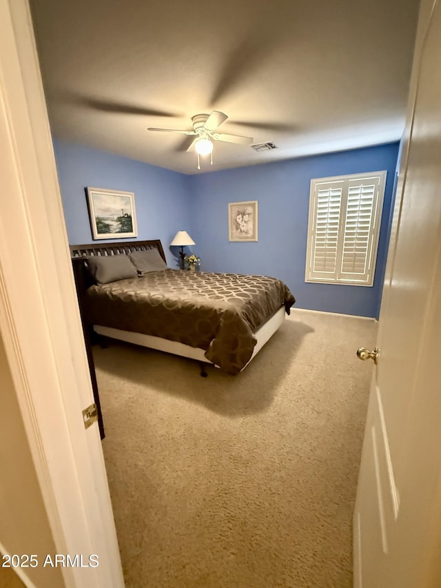 3891 E Simpson Rd, Gilbert, AZ 85297 - carpeted bedroom with a ceiling fan