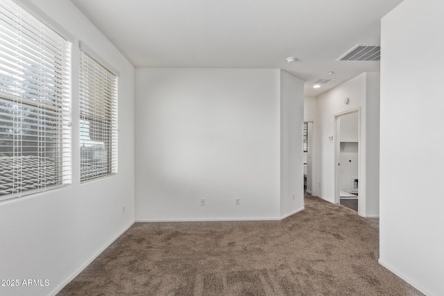 view of carpeted spare room