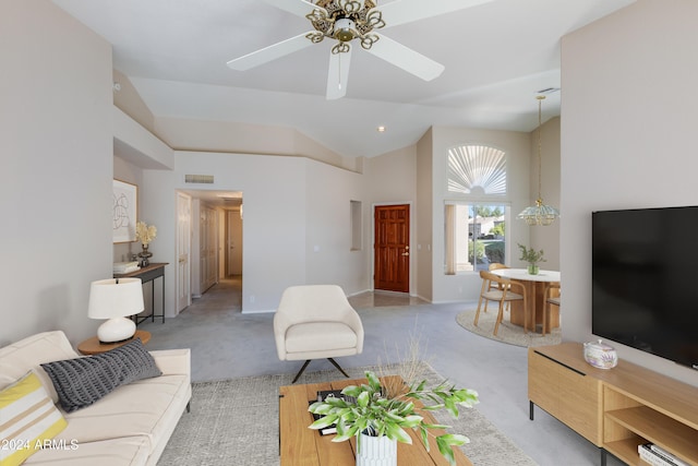 living room featuring ceiling fan, light colored carpet, and high vaulted ceiling