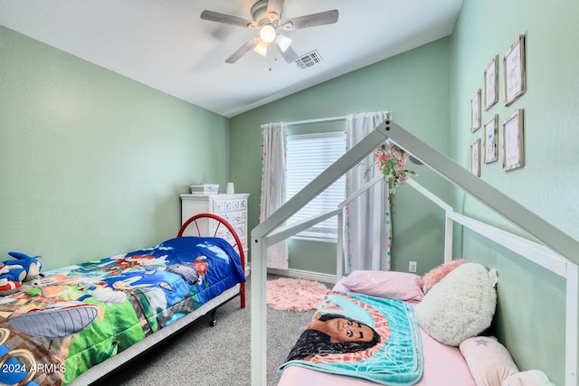 bedroom with carpet flooring, ceiling fan, and lofted ceiling