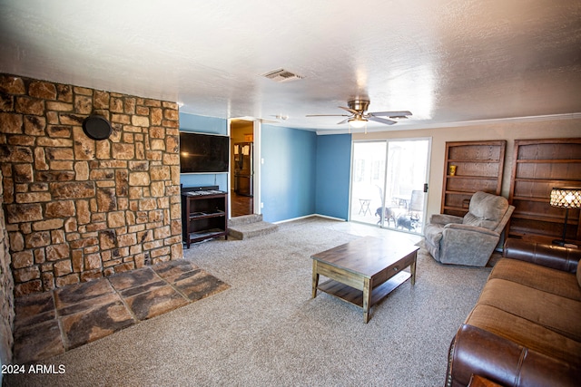 living room with carpet, a textured ceiling, and ceiling fan