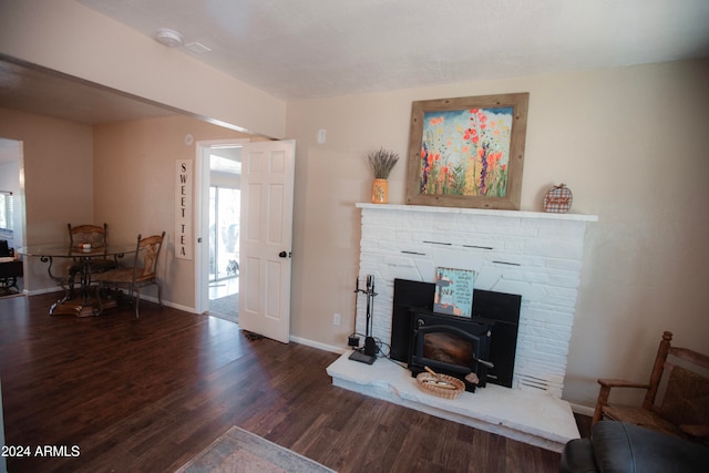 living room featuring dark hardwood / wood-style flooring