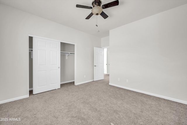 unfurnished bedroom with carpet floors, a closet, ceiling fan, and baseboards