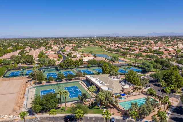 drone / aerial view featuring a residential view and a mountain view