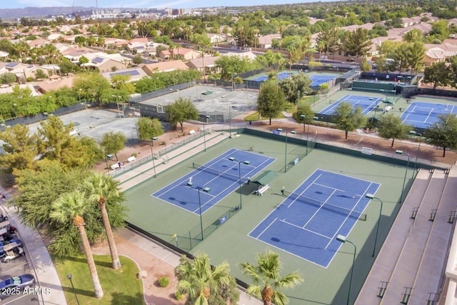 birds eye view of property with a residential view