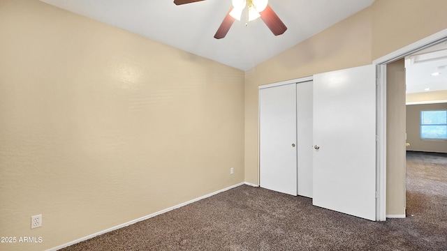 1909 N 106th Ave, Avondale, AZ 85392 - unfurnished bedroom featuring ceiling fan, a closet, dark carpet, and lofted ceiling
