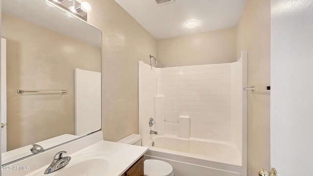 1909 N 106th Ave, Avondale, AZ 85392 - bathroom with bathing tub / shower combination, vanity, visible vents, and toilet