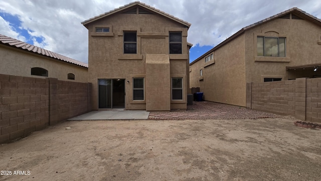 1909 N 106th Ave, Avondale, AZ 85392 - rear view of property with fence, a patio, and stucco siding