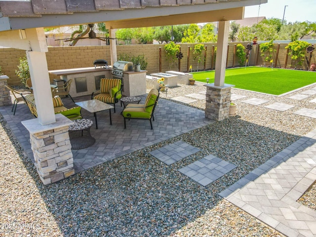 3915 N Shannon Cir, Mesa, AZ 85215 - fenced backyard with area for grilling and a patio