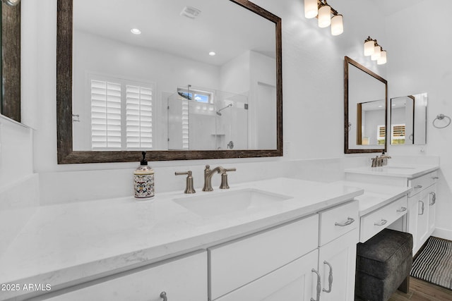 3915 N Shannon Cir, Mesa, AZ 85215 - full bathroom with vanity, a stall shower, wood finished floors, and recessed lighting