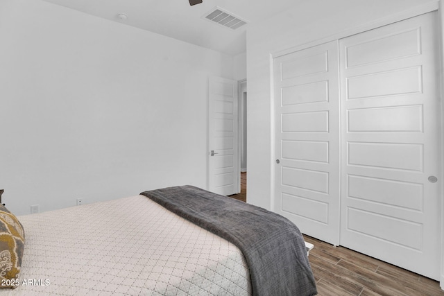 3915 N Shannon Cir, Mesa, AZ 85215 - bedroom with wood finished floors and a closet