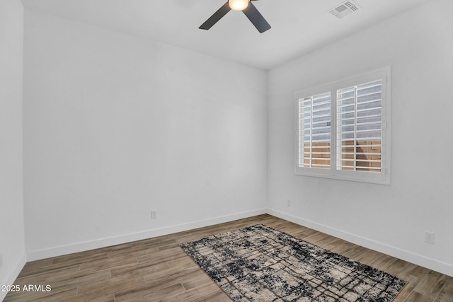3915 N Shannon Cir, Mesa, AZ 85215 - empty room featuring a ceiling fan and wood finished floors