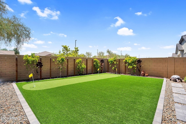 3915 N Shannon Cir, Mesa, AZ 85215 - fenced backyard featuring an area to practice putting