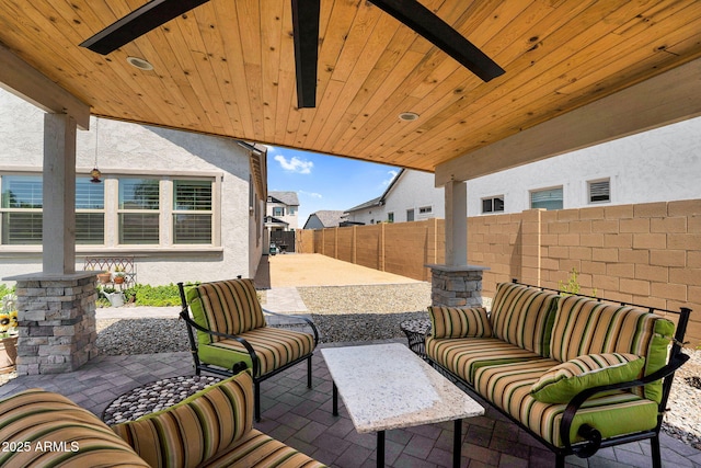 3915 N Shannon Cir, Mesa, AZ 85215 - fenced backyard with a patio area and an outdoor living space