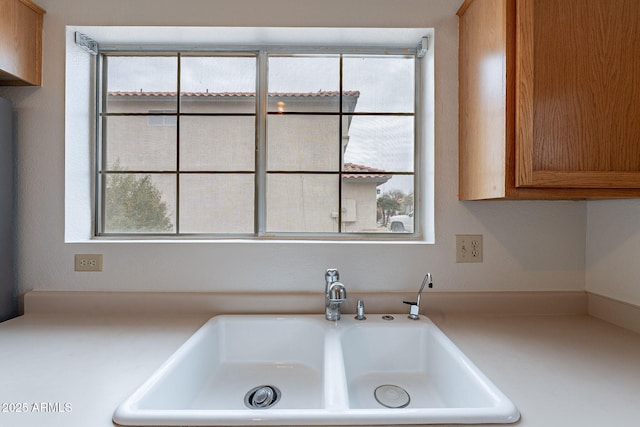 kitchen with sink and a wealth of natural light