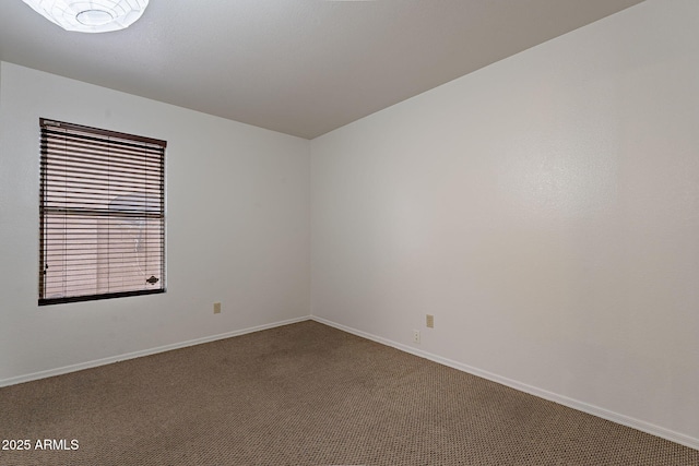 empty room with carpet flooring