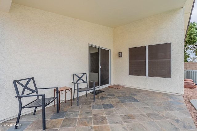 view of patio / terrace with central AC