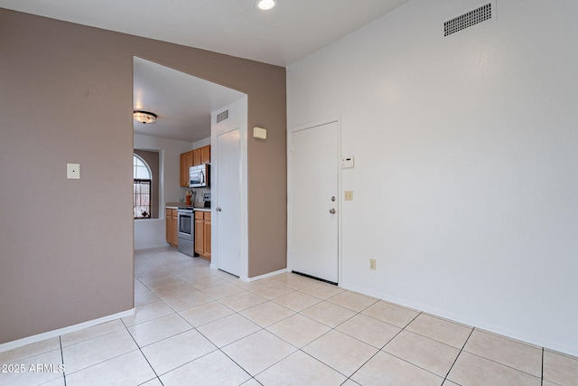 interior space with light tile patterned flooring