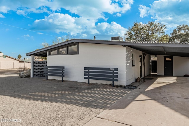 view of front of house with a carport