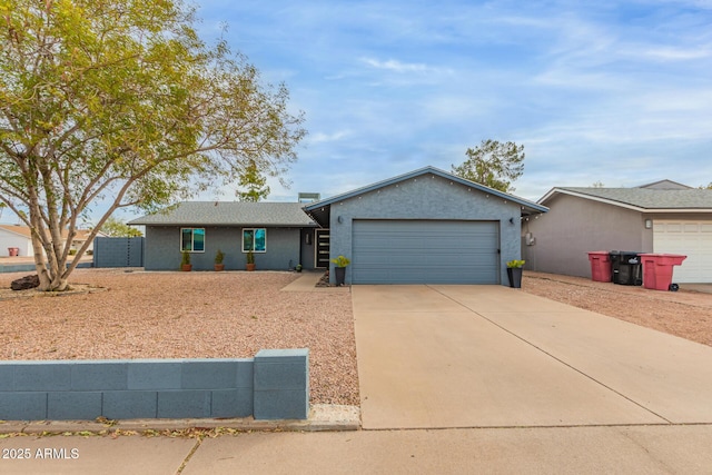 single story home featuring a garage