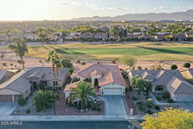 birds eye view of property with a mountain view