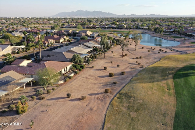 birds eye view of property featuring a water and mountain view