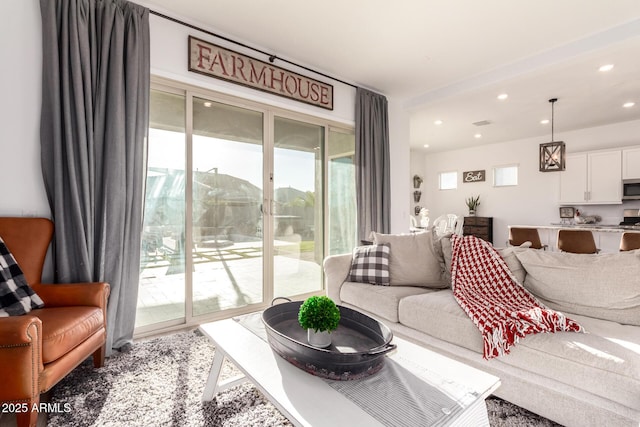 living room with recessed lighting