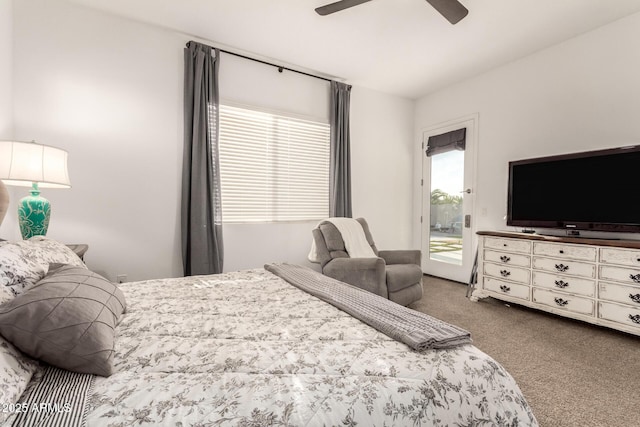 bedroom with access to exterior, carpet, and a ceiling fan