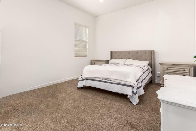 bedroom with carpet and baseboards