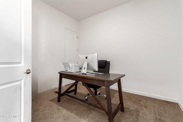 home office featuring carpet and baseboards