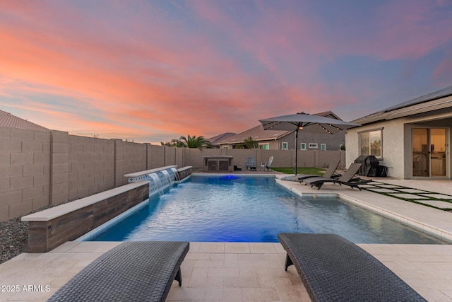 view of swimming pool with a patio, a fenced backyard, and a fenced in pool