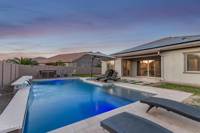 view of swimming pool featuring a patio area, a fenced backyard, and a fenced in pool