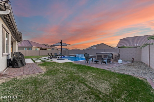 view of yard with a patio, a fenced backyard, and a fenced in pool