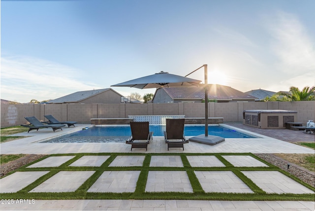 view of swimming pool with a fenced backyard, a fenced in pool, and a patio