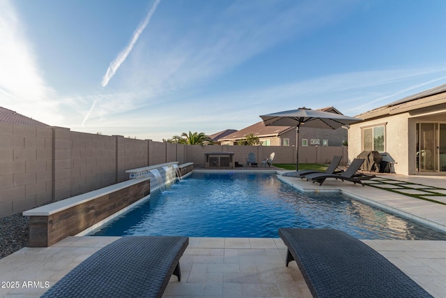 view of pool with a patio area, a fenced backyard, and a fenced in pool