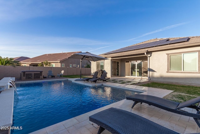 view of pool featuring a patio, a fenced backyard, and a fenced in pool