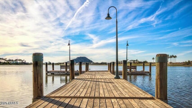 view of dock featuring a water view