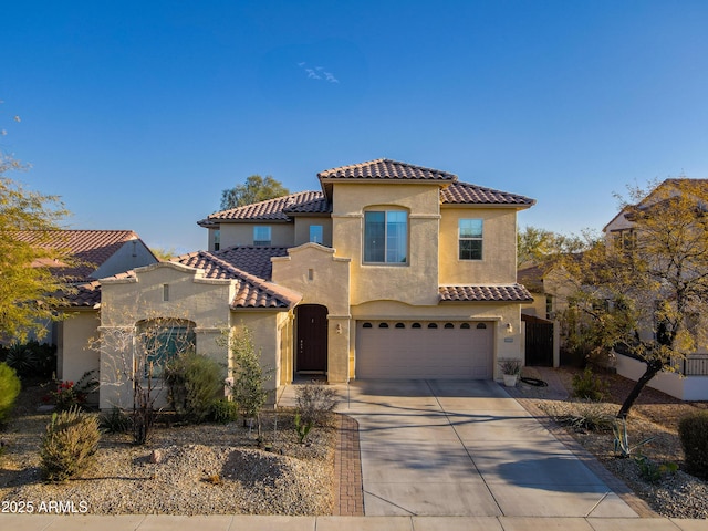 mediterranean / spanish-style home featuring a garage