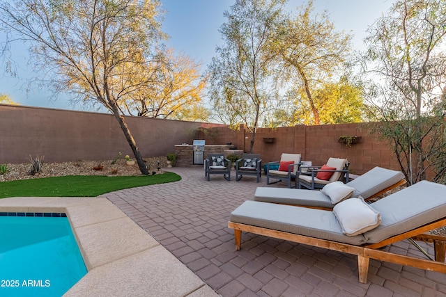 view of patio / terrace with area for grilling and an outdoor hangout area