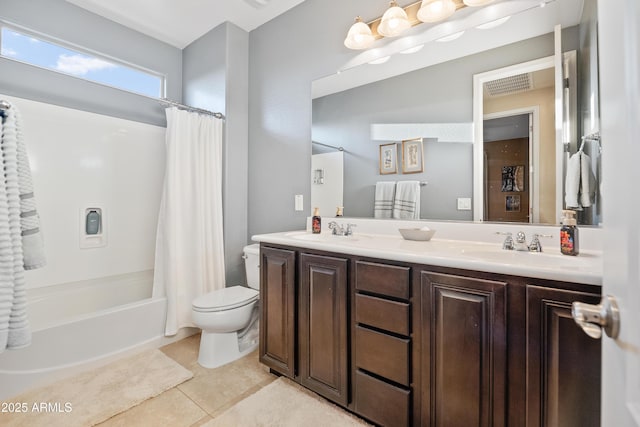 full bathroom featuring shower / bath combination with curtain, tile patterned floors, vanity, and toilet