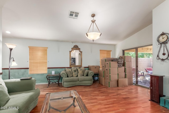 living area with wood finished floors