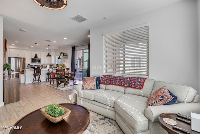 4100 S Pinelake Way Unit 149, Chandler, AZ 85249 - living area with light wood-type flooring and recessed lighting