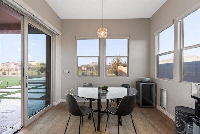 dining space featuring light hardwood / wood-style flooring