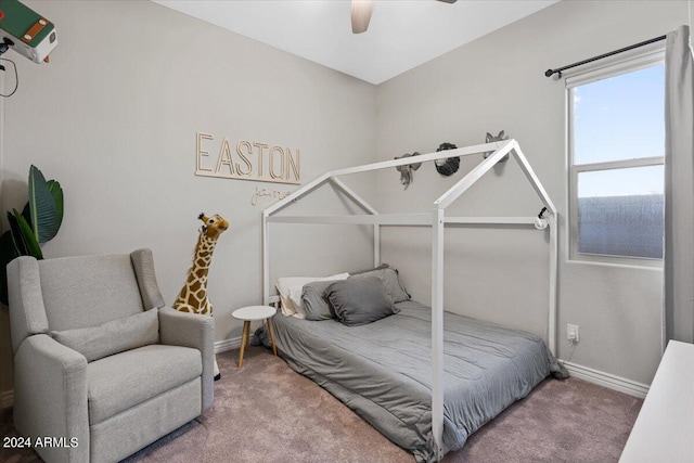 bedroom with ceiling fan and carpet floors