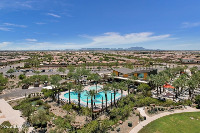 birds eye view of property with a mountain view